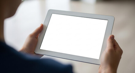 Bright tablet screen held intently for clear vision.