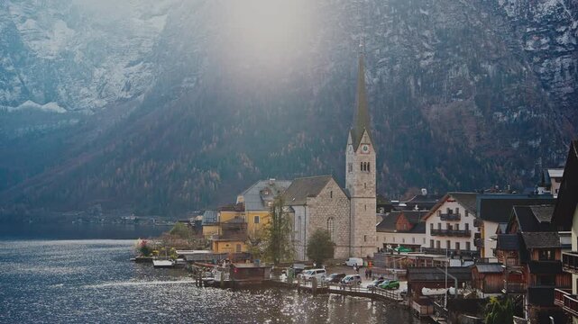 Scenic Alpine Village by Mountain Lake In Halstatt,Austria.Filmed on 18 November 2025.Editorial footage.