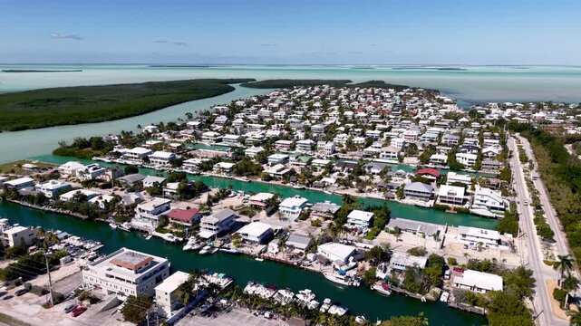 high aerial push in to islamorada florida homes and boats