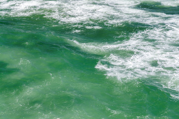 Turquoise ocean waves close up