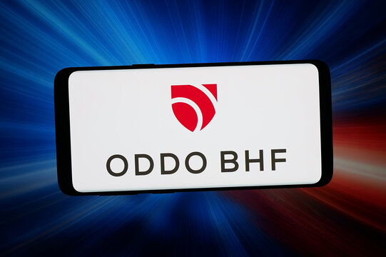 Stuttgart, Germany - 02-25-2026: In this photo illustration, the logo of French financial services company ODDO BHF is displayed on a smartphone in front of abstract background on computer screen.