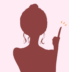 人差し指をさすお団子頭の女性　影絵