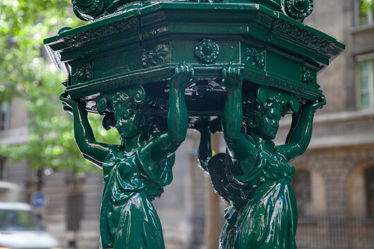 Iconic Green Wallace Fountain with Caryatid Sculptures in Paris with Copy Space