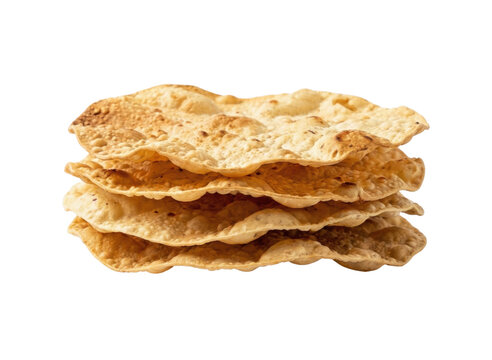 Stack of crispy baked papadums isolated. Traditional Indian flatbread snack concept.
