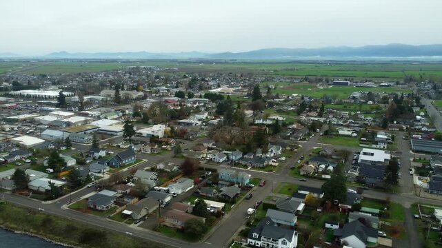 US, OR, Harrisburg, , 2025-11-23 - Drone view of the city of Harrisburg along the Wilamette River between Eugene and Corvallis in fall