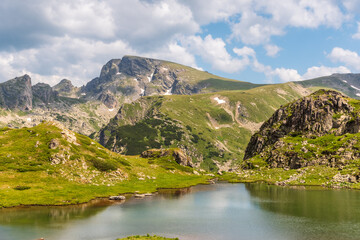 Obraz premium Serene Alpine Lake in the Rila Mountains, Bulgaria