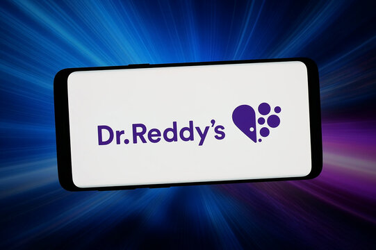 Stuttgart, Germany - 02-25-2026: In this photo illustration, the logo of company Dr. Reddy's Laboratories Ltd. is displayed on a smartphone in front of abstract background on computer screen.