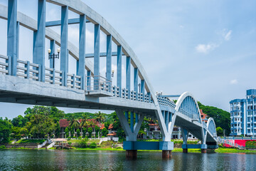 Fototapeta premium Concrete bridge and river view in Aluva town of Kerala, India.