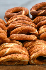 Traditional Turkish white bread Simit with sesame at a street market in Turkey, vertical picture