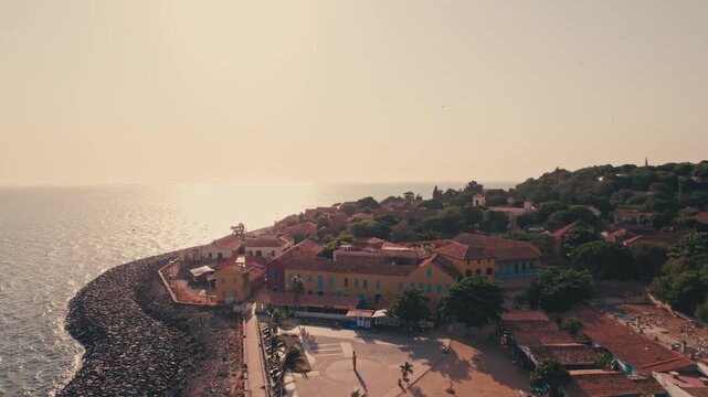 Aerial view of Gor&eacute;e Island, a UNESCO World Heritage site, is magical during the day with a magical sunset