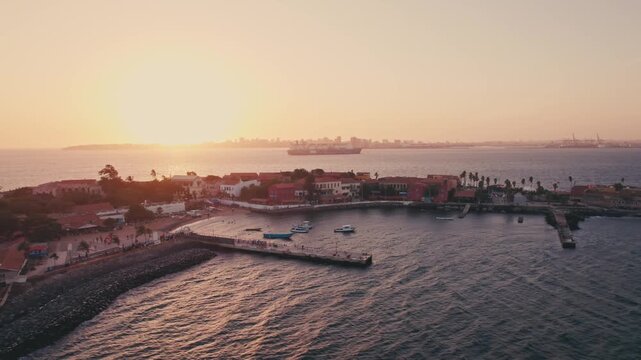 Aerial view of Gor&eacute;e Island, a UNESCO World Heritage site, is magical during the day with a magical sunset