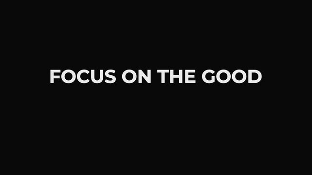 Focus on the good kinetic typography with a positive quote animation appearing on a black background, representing a motivational message of optimism and mindfulness