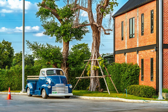 NAKHON RATCHASIMA, THAILAND-DECEMBER 13,2020 : Beautiful Classic Chevrolet Half Ton COE or Cab Over Engine vintage truck restored antique American pickup truck and retro blue paint at PTT gas station.