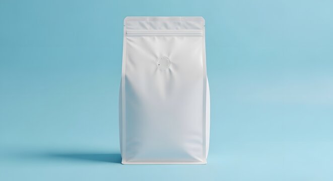 A professional matte white gusseted coffee bag mockup with a degassing valve, isolated on a light blue background. Perfect for premium coffee bean or specialty tea packaging design.