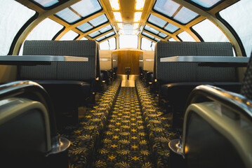 Inside a tarp-covered dome passenger rail car © XMCDVI