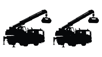 Two construction cranes with wrecking balls in stark black silhouette © MdMosharef