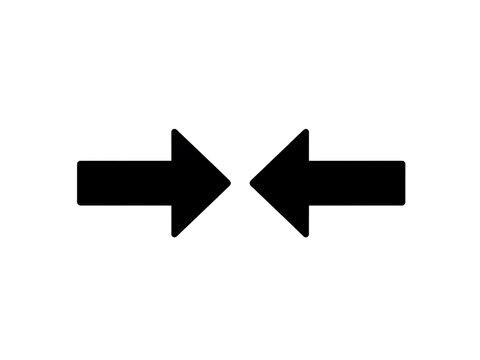 A simple black icon of two opposing arrows on a white background. isolated on white background