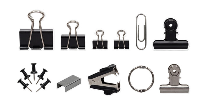 Flat-lay monochrome office clips and fasteners .