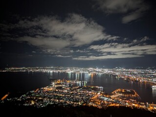 Obraz premium Stunning Night View of Hakodate City and Bay