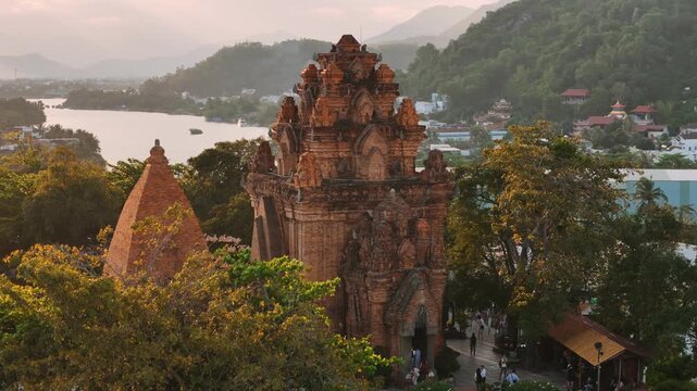 Aerial view of po nagar cham towers  temple in nha trang, vietnam at sunset with the cai river and city in the background