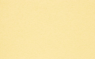 Fototapeta premium Light yellow plastered dry wall texture, light rough chips dry wall texture as background