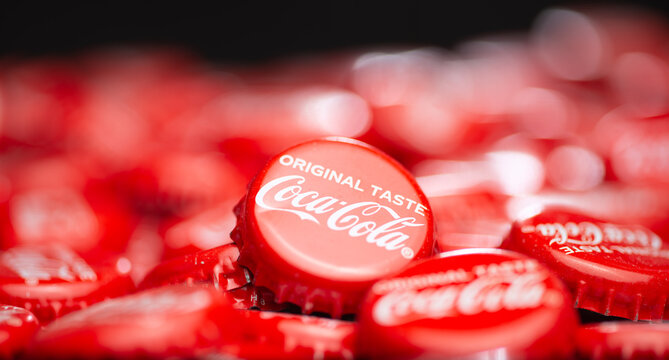 Studioshot of red Coca Cola Coke lemonade bottle caps