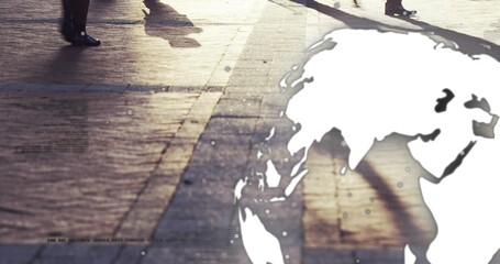 Walking legs wearing coats crossing tiled plaza casting long shadows, with world map, copy space © vectorfusionart