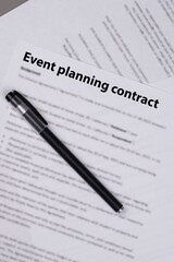 Event planning contract on desk, professional agreement for organizing celebrations and corporate events, symbol of cooperation, creativity, and business partnership.