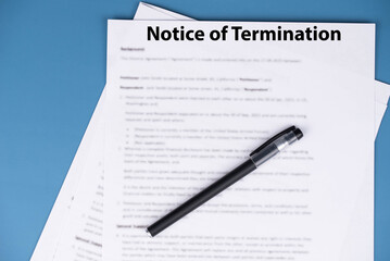 Obraz premium Notice of termination document on office desk, official HR paper announcing job dismissal or contract ending, symbol of decision, change, and professional transition.