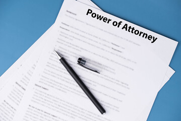 Obraz premium Power of Attorney legal document on desk, official authorization to act on someone’s behalf, symbol of trust, responsibility, and financial or medical decision making.