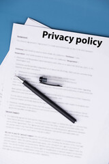 Privacy policy document on desk, legal statement explaining how personal data is collected, used, shared, and protected, symbol of transparency, trust, and online compliance.