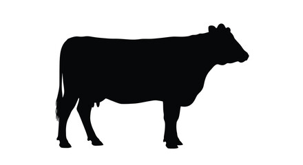 A black silhouette of a cow standing in a field silhouette