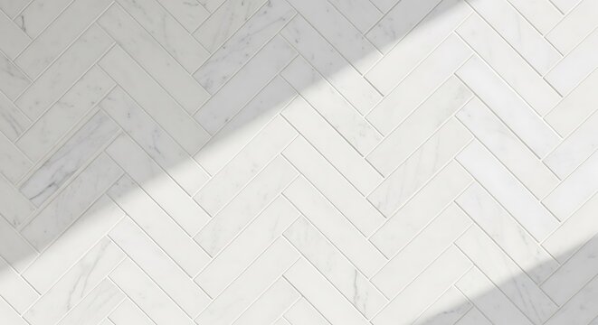 Close-up of white marble herringbone pattern floor with sunlit diagonal shadow