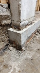 Obraz premium Detail of a Concrete Foundation Wall and Footing Undergoing Structural Repair and Basement Renovation