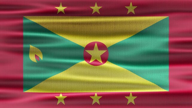 Grenada flag waving in the wind with high quality fabric texture