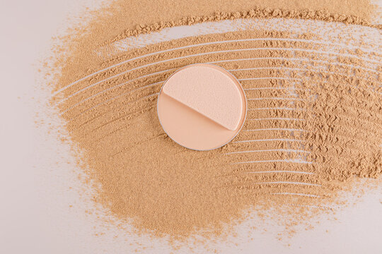 Compact powder with sponge and loose powder spread