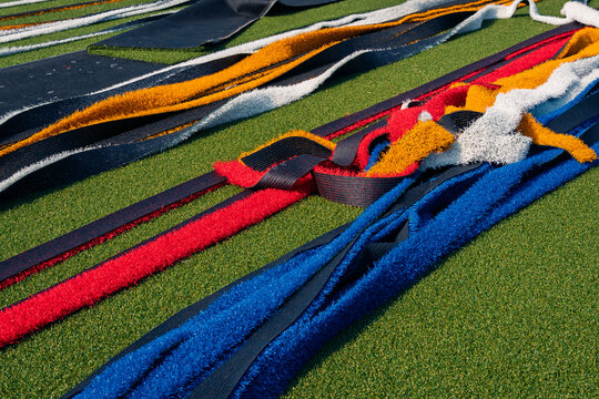 Soccer field renovation materials on artificial turf