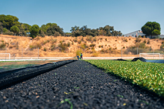 Soccer field renovation project with new turf installation