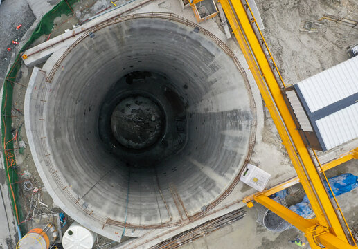 Vertical view of construction tunnel and heavy machinery