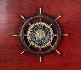 Wooden steering wheel with a world map