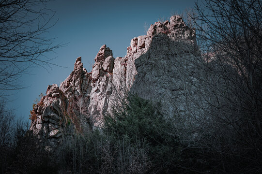 Bruchhauser Steine, a mighty rock formation towering over sparse vegetation, spring, hiking in the Sauerland region, the Briloner Kammweg trail from 59929 Brilon to 34508 Willingen (Upland), Germany