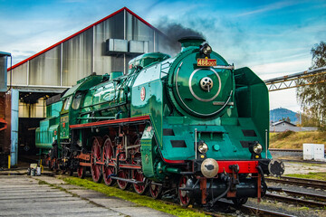 steam locomotive resting in the evening at the depot before performance © sever07