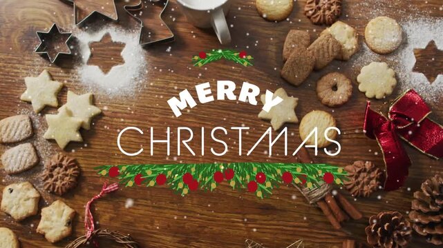 Animation of merry christmas text over christmas cookies and decorations on wooden background
