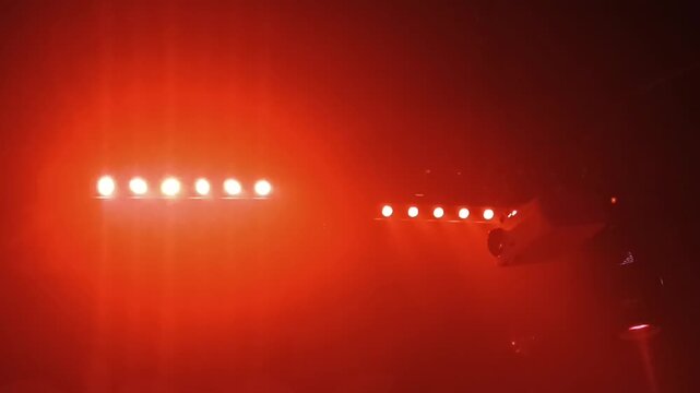 Spotlights and laser beams. Concert light. Stage lights. Soffits