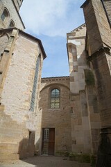 Naklejka premium Cluny, France - April 11th 2022: Inside the walls of the Cluny abbey