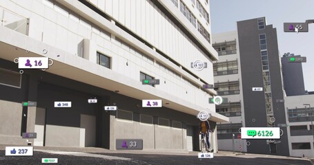Pedaling Asian rider on bike with backpack on urban street by building, floating badges, copy space