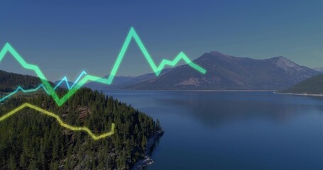 Fototapeta premium Showing forested peninsula and mountain lake from overlook, with three glowing line-graph overlays