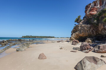 Low tide sandy area of New Zealand Beach a secluded scenic beach named after country of origin of early goldminers.