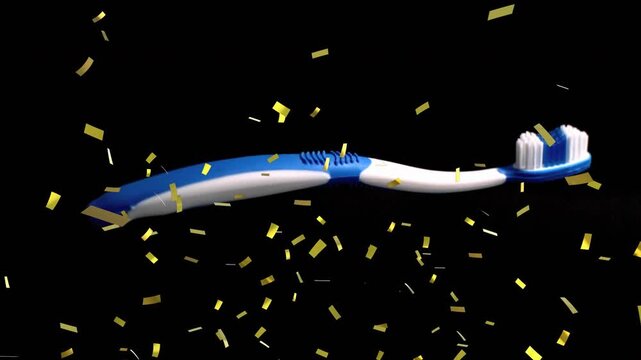 Confetti releasing, brush moving right and rotating while reflection rising, showing bristle detail