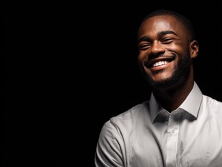 Fototapeta premium bank employee smiling isolated on a black background